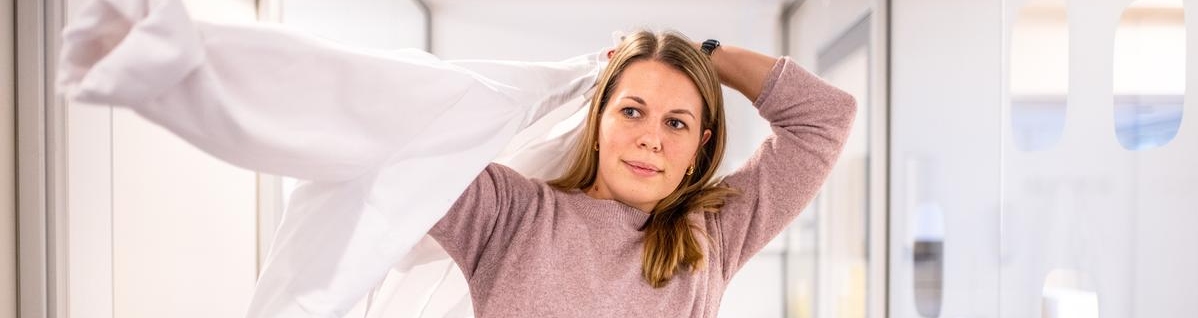 Woman in lab coat