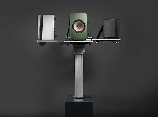 Grey, green and black speakers mounted on metal Low Noise Rapid Speaker Spinners stand